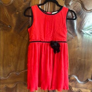 Red Sleeveless Dress with Black Trim